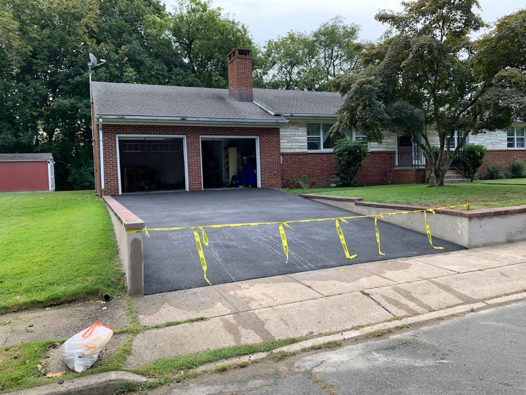 Finished asphalt driveway in Long Island